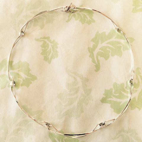Necklace with Seven Twisted Links