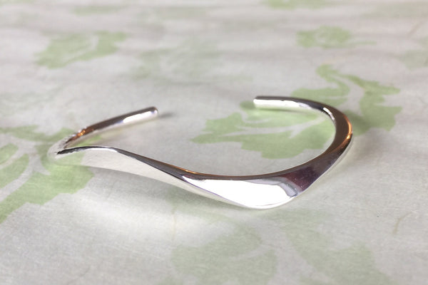 Cuff with Angled Surfaces