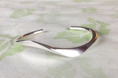 Cuff with Angled Surfaces